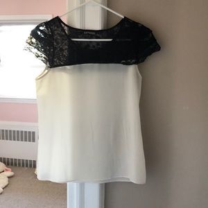 Express cream colored blouse with black lace